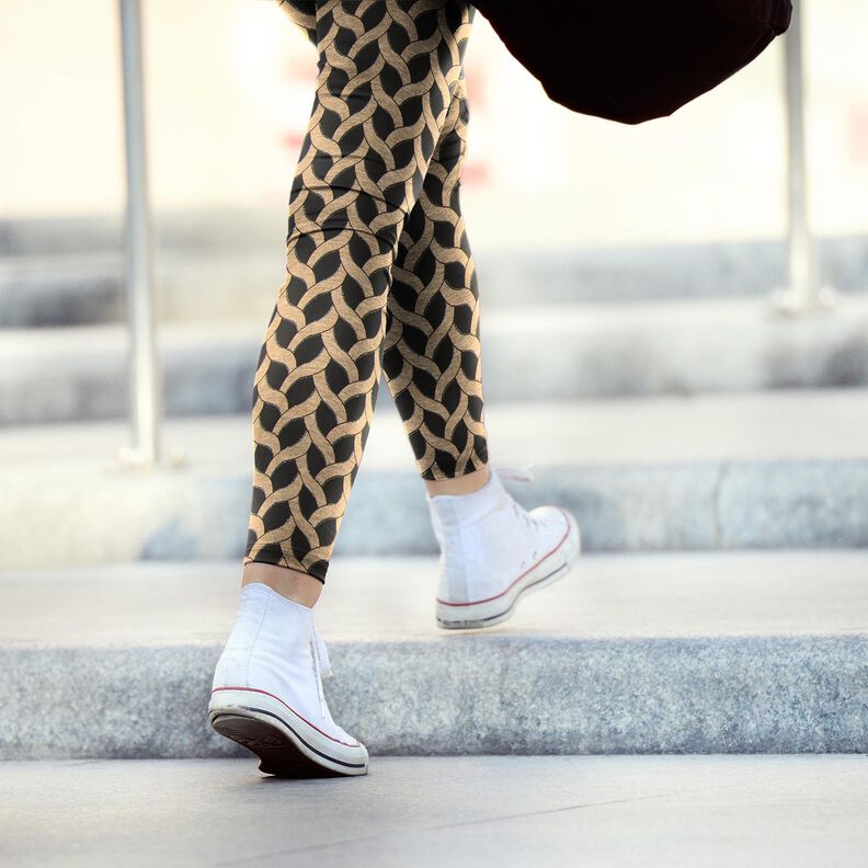 Viskosjersey glittrigt flätmönster – svart/apricot,  image number 6