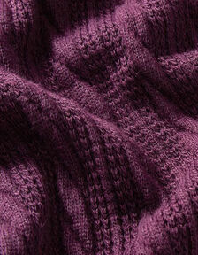 Stickat tyg i cremevitt med grå ränder